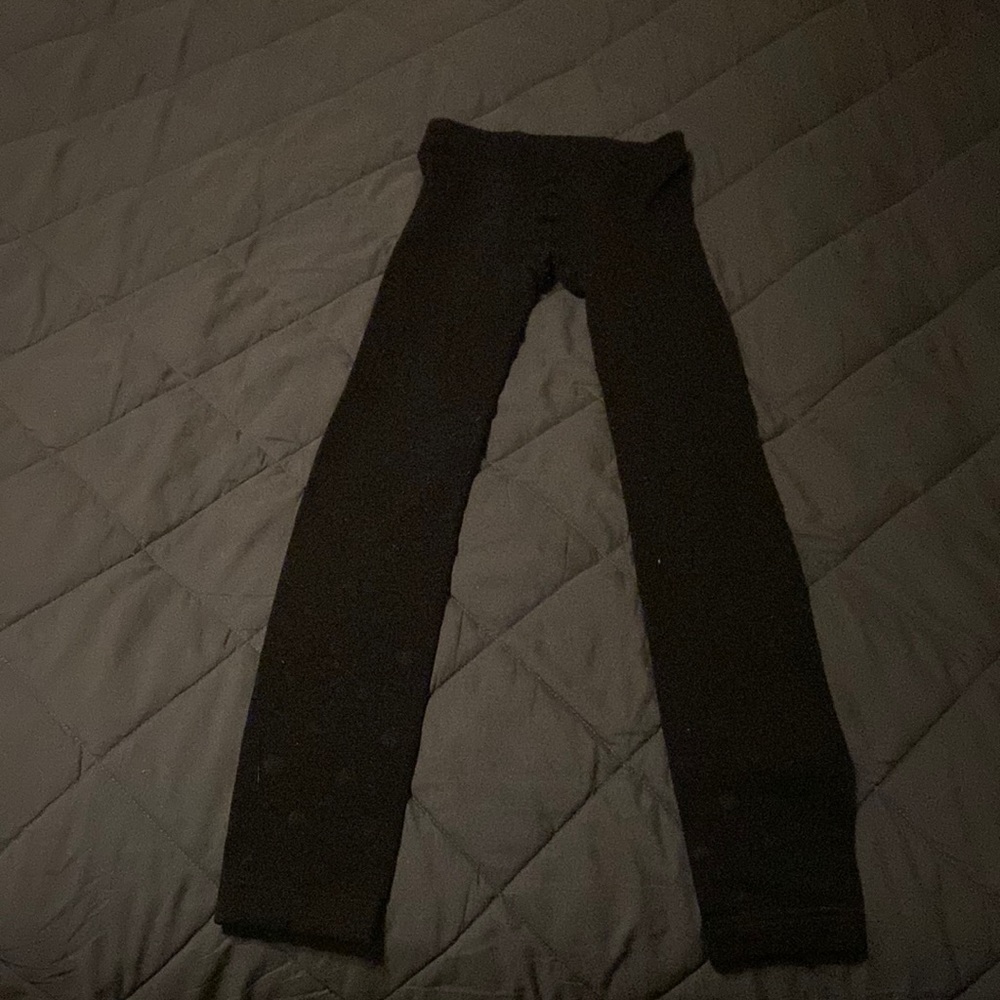 Black, polka dotted leggings. No Boundaries size 4.